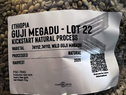 A transparent bag of Ethiopia Guji Medadu green beans kickstart natural process.